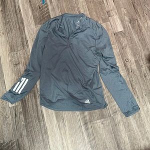 This is a blue Adidas shirt it is a womens medium